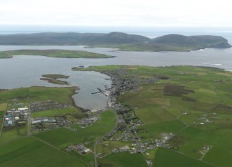 General oblique aerial view centred on the town, taken from the N.
