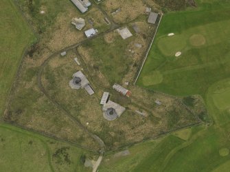 Oblique aerial view centred on the coastal battery, taken from the S.