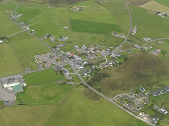 Oblique aerial view centred on the village, taken from the E.
