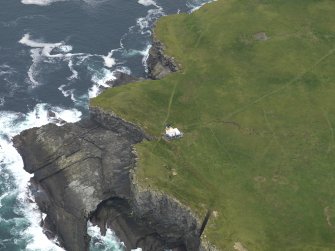 Oblique aerial view centred on the lighthouse, taken from the SW.