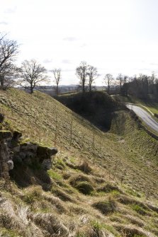 View along the N face of the castle mound from E showing the ditch