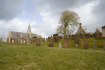View looking NE across graveyard of Dalton Old Parish Church, showing the ruinous 18th century church in relation to its late-19th century successor