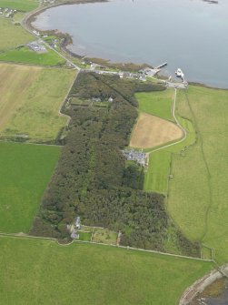 General oblique aerial view centred on the country house and policies, taken from the WSW.