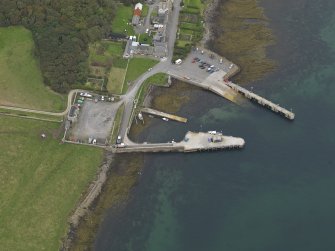 Oblique aerial view centred on the harbour  taken from the SE.