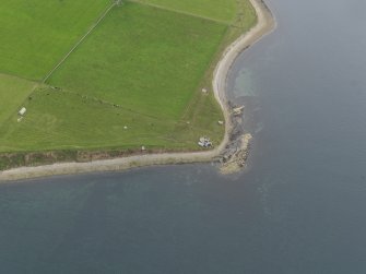 Oblique aerial view centred on the Galtness Coastal Battery, taken from the NNW.