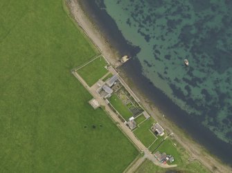 Oblique aerial view centred on Carrick House, taken from the SE.