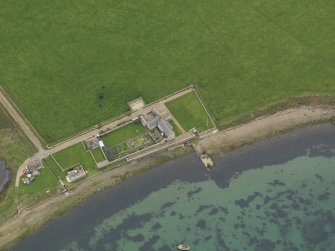 Oblique aerial view centred on Carrick House, taken from the NE.