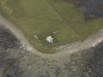 Oblique aerial view centred on the lighthouse, taken from the ESE.