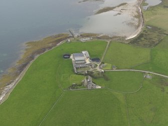 Oblique aerial view centred on the farmhouse, taken from the NNE.