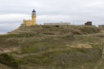 General view of lighthouse and keepers cottage with Port War Station, taken from the WNW.