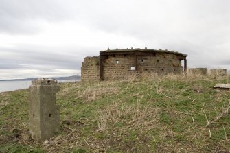 General view of rear of gun emplacement No.2 showing brick and concrete canopy from SSE.