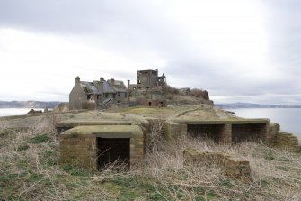 View of anti aircraft emplacement with the Coastguard cottages, water catchment aera and Port War Station in the background, taken from the SSE.