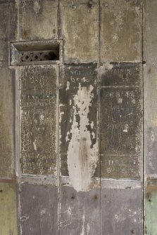 Detail of faded painted wall instruction panel and ventilator in PF No.4 cell, Fire Control point.