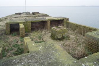 View of raised holdfast and ready use ammunition lockers from N.