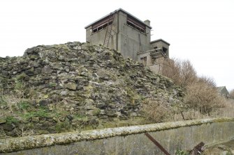 View of a section of 16th century wall surviving rubble infill from SE.