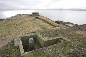 General view of the S end of the Island with 'B' group gun emplacement and a concrete position in the foreground from the N.