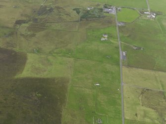 General oblique aerial view of the remains of the farmsteads around Kingarly on Rousay, taken from the S.