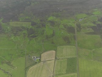 General oblique aerial view of the remains of the farmsteads and fields at Castlehill on Rousay, taken from the N.