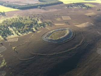 Oblique aerial view centred on the remains of the fort, taken from the N.