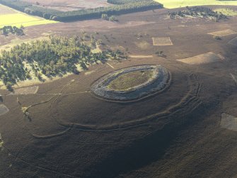 Oblique aerial view centred on the remains of the fort, taken from the NNW.