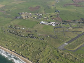 Oblique aerial view of the bomb stores at Machrihanish Airfield, taken from the SW.