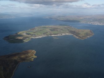 General oblique aerial view of the Great Cumbrae Island and Millport village, taken from the SSW.