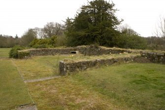 Remains of earlier house to the east