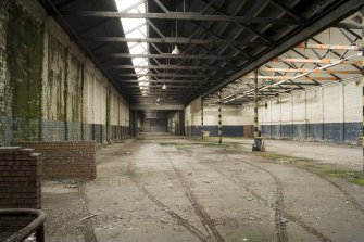 Interior, main hall showing roof and in situ tram tracks, from WNW.