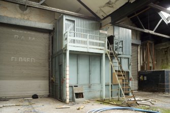 Interior, main hall showing mezzanine floor store with room below.