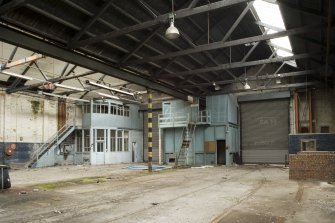 Interior, main hall showing store and office.