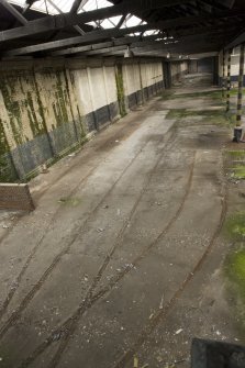 Interior, main hall N side showing extant tram tracks.