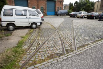 View of tram track crossover at W end of depot, from WNW.