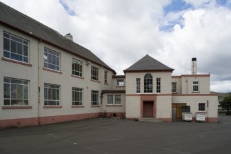 View of rear of school with rear entrance block from E.