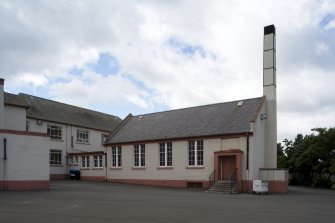 View of rear of school including hall/chapel from NE.