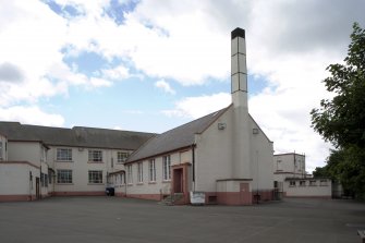 View of rear of school including hall/chapel from NE.