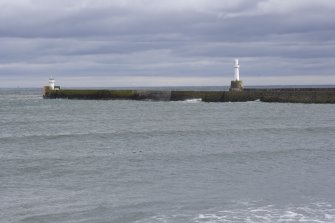 Pier with south breakwater beyond, view from W