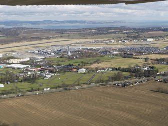 General view centred on the airport, taken from the SW.