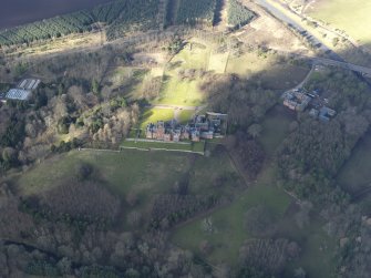 Oblique aerial view centred on the country house, taken from the SE.
