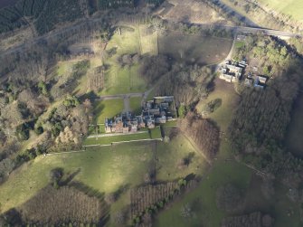 Oblique aerial view centred on the country house, taken from the SSE.