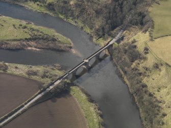 Oblique aerial view centred on the bridge with the toll house adjacent, taken from the ENE.