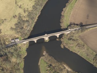 Oblique aerial view centred on the bridge with the toll house adjacent, taken from the SSW.