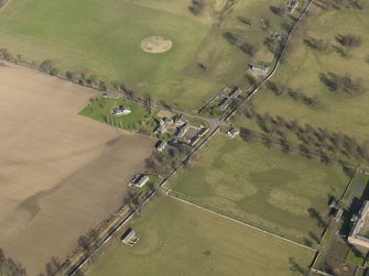 Oblique aerial view centred on the Home Farm, taken from the WSW.