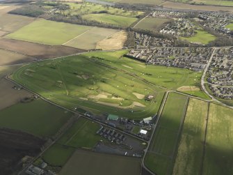 Oblique aerial view centred on the race course, taken from the NW.