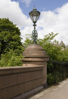 Detail of lamp on plinth