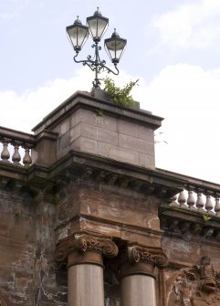 Detail of column heads and lamp