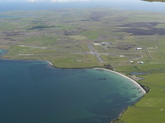 General oblique aerial view centred on Kirkwall Airport, taken from the N.