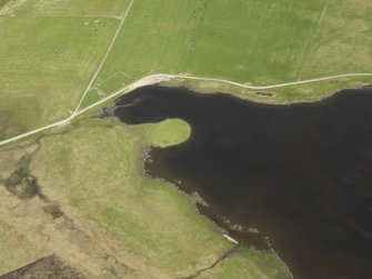 Oblique aerial view centred on the ruins of a farmstead at Loch of Wasdale, taken from the WSW.