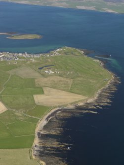 General oblique aerial view centred on Ness Battery with Stromness beyond, taken from the W.