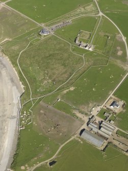 General oblique aerial view centred on Skara Brae with Skaill House and farm adjacent, taken from the W.