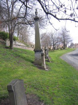 General view of headstones, including monument in memory of James Mitchell.